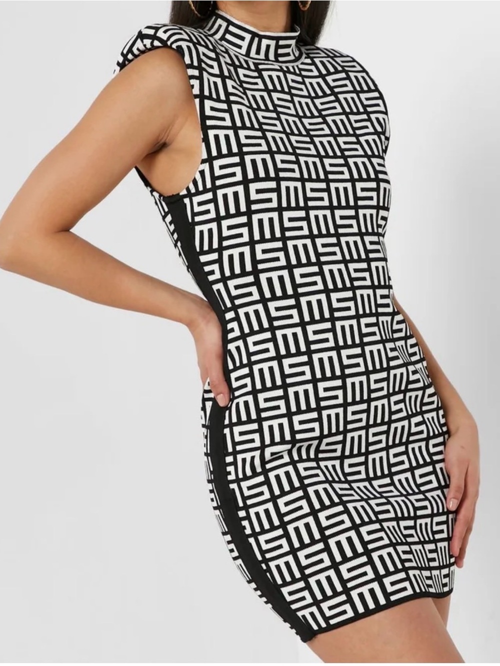 Catchall Sleeveless Geometric Mock Neck Mini L
Bandage Dress